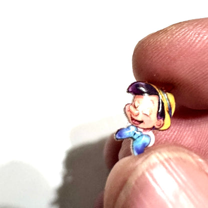 Pinocchio stud earrings